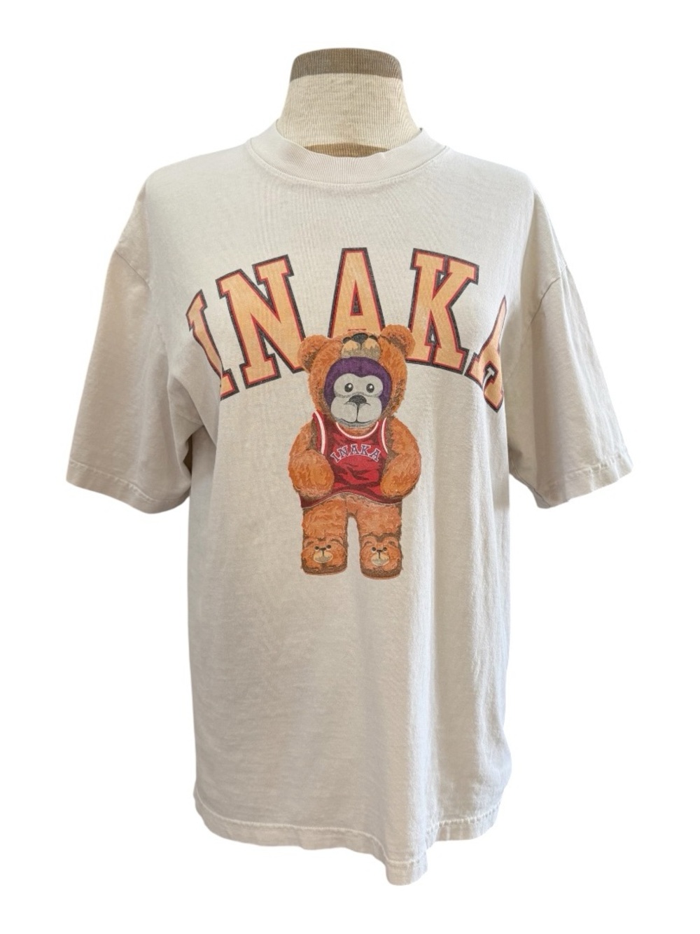 Inaka Power shirt features a teddy bear graphic in a basketball jersey M